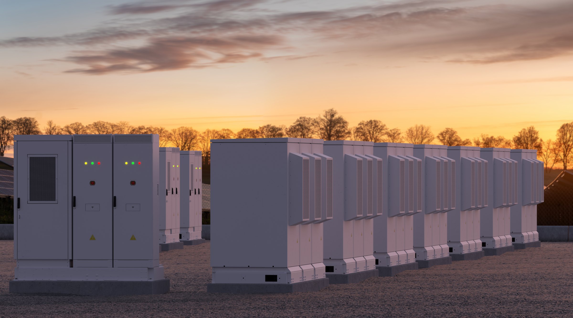 Battery storage cabinets at sunset