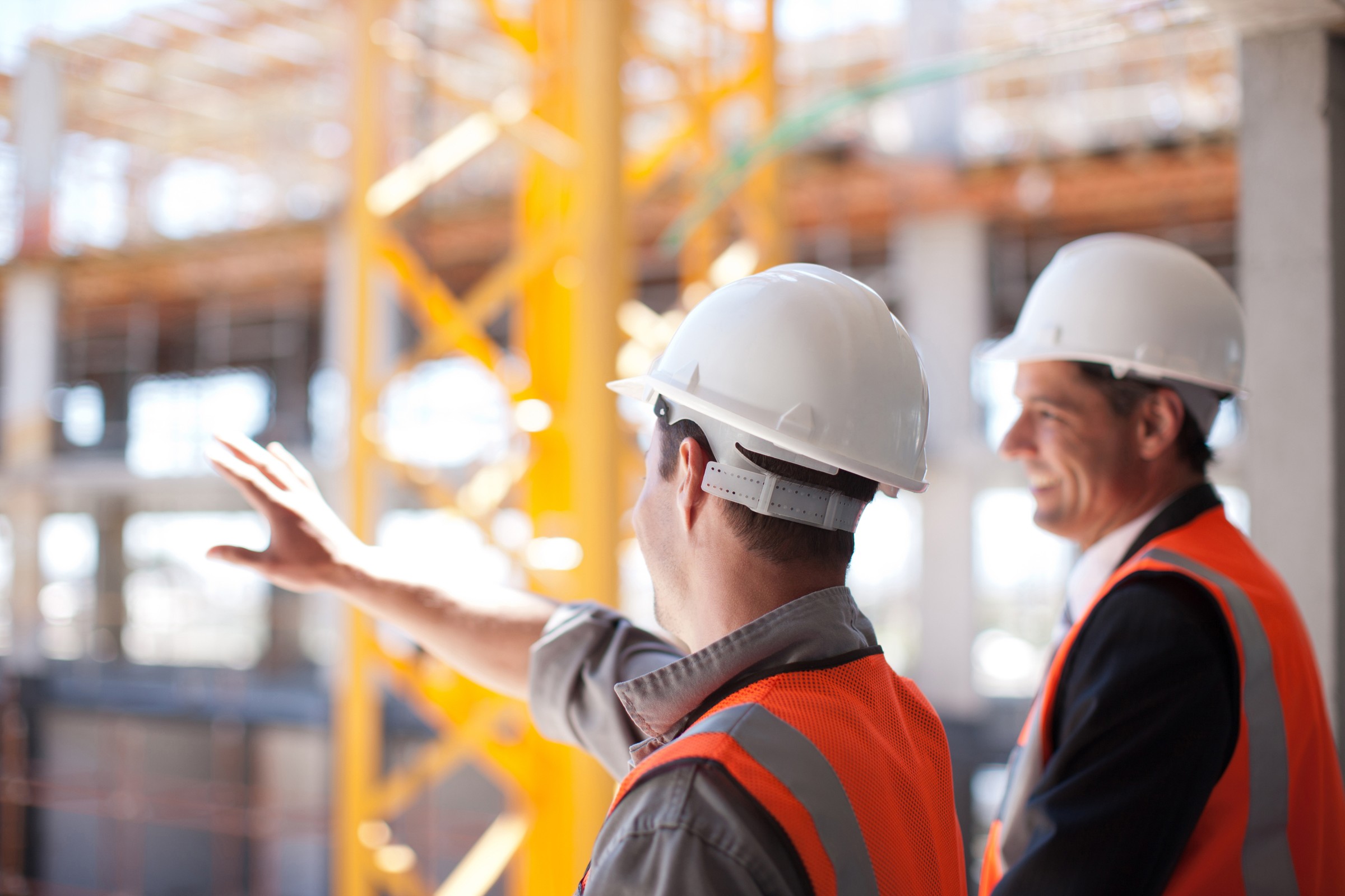 Construction team reviewing project plans