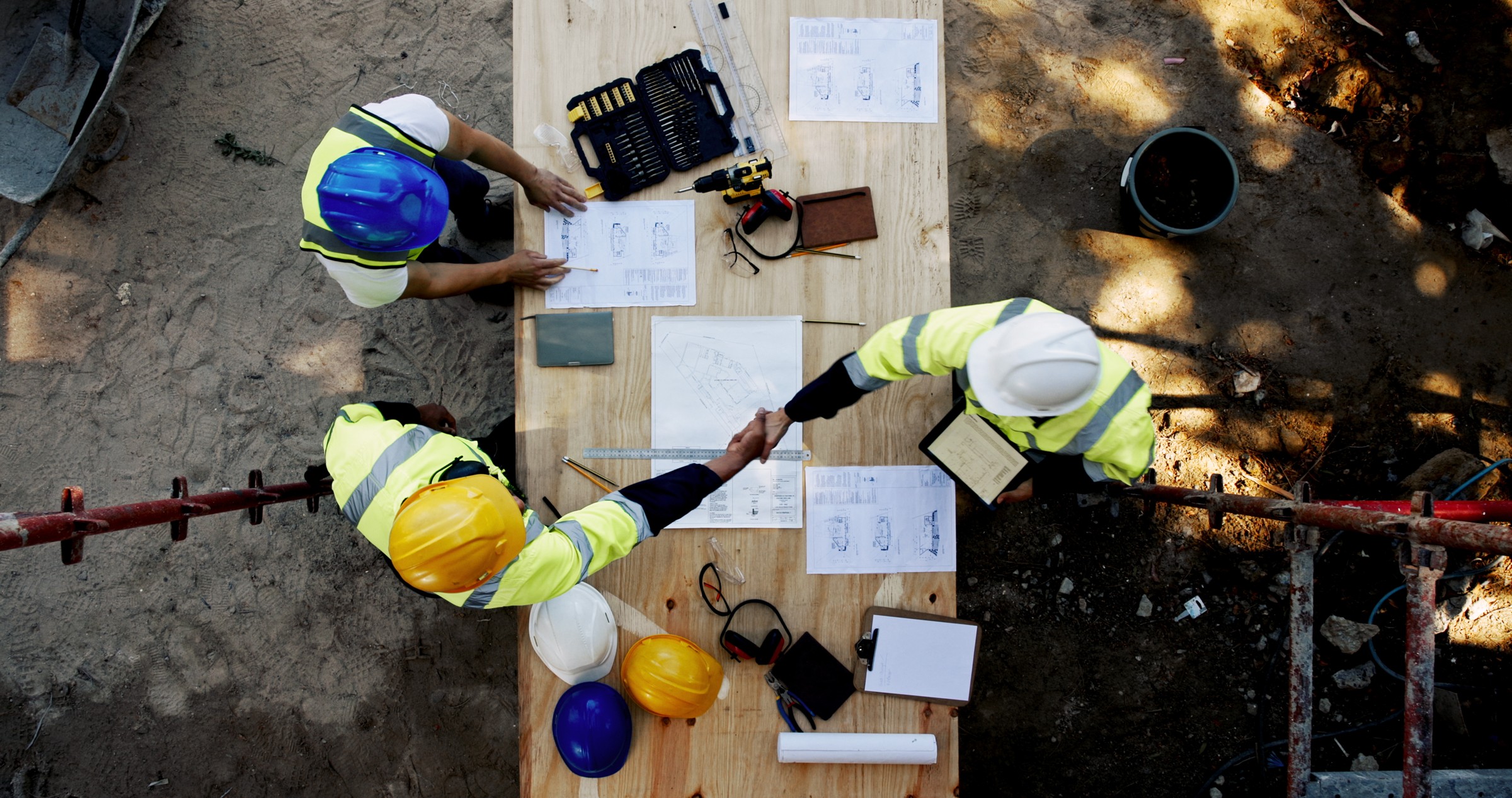 Project team reviewing construction plans