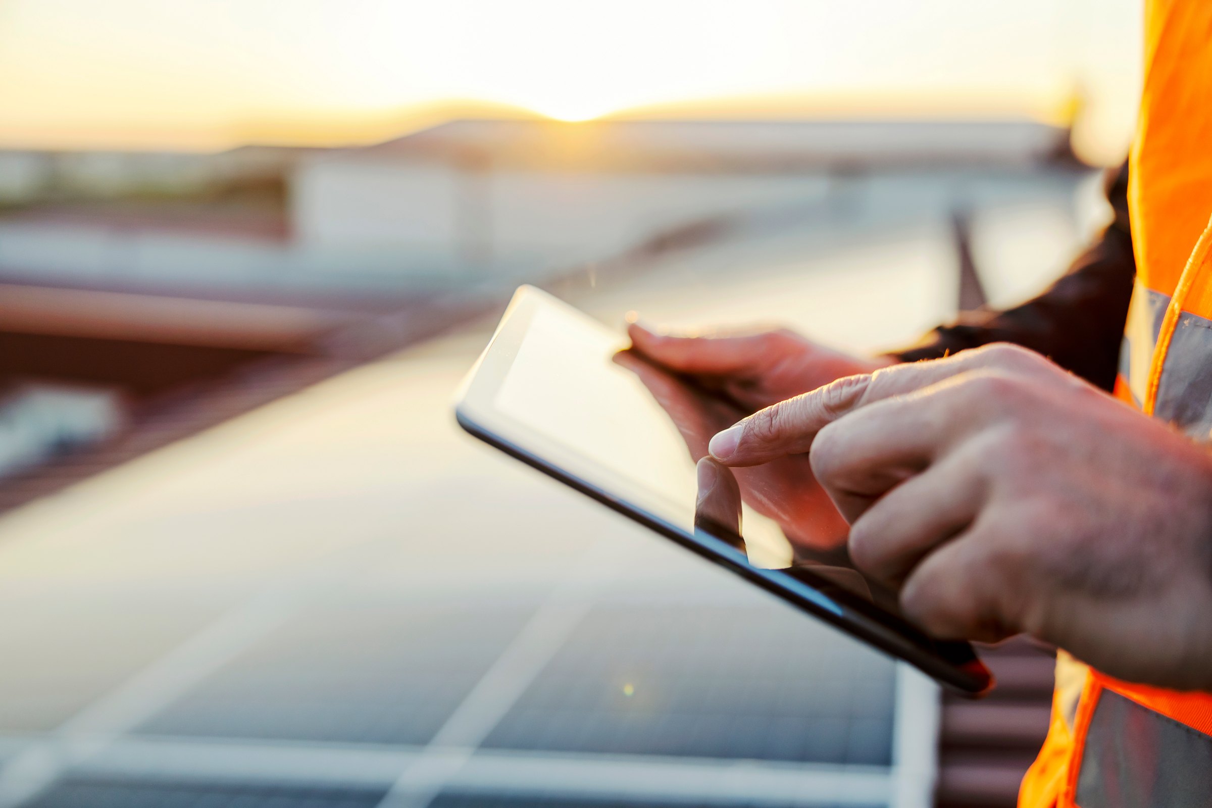 Technician recording a solar inspection checklist